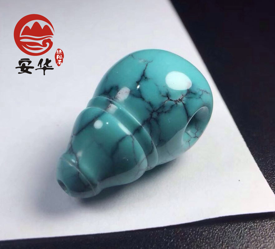 水草纹绿松石佛头